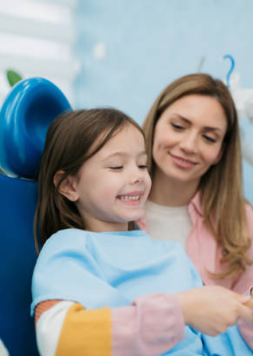 Happy child during a friendly dental check-up at Adelaide Dental Spa