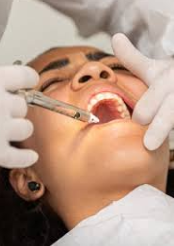 Dentist examining patient at Adelaide Dental Spa